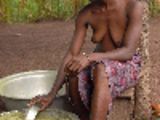 African woman attacked while cooking