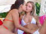 Lesbians kissing in bikinis