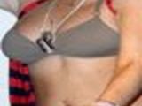 Lindsay Lohan takes shirt off in club