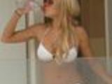 Lindsay Lohan huge tits in tiny bikini top